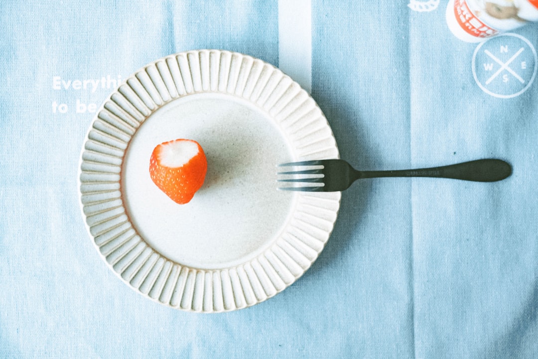 orange fruit on white paper plate