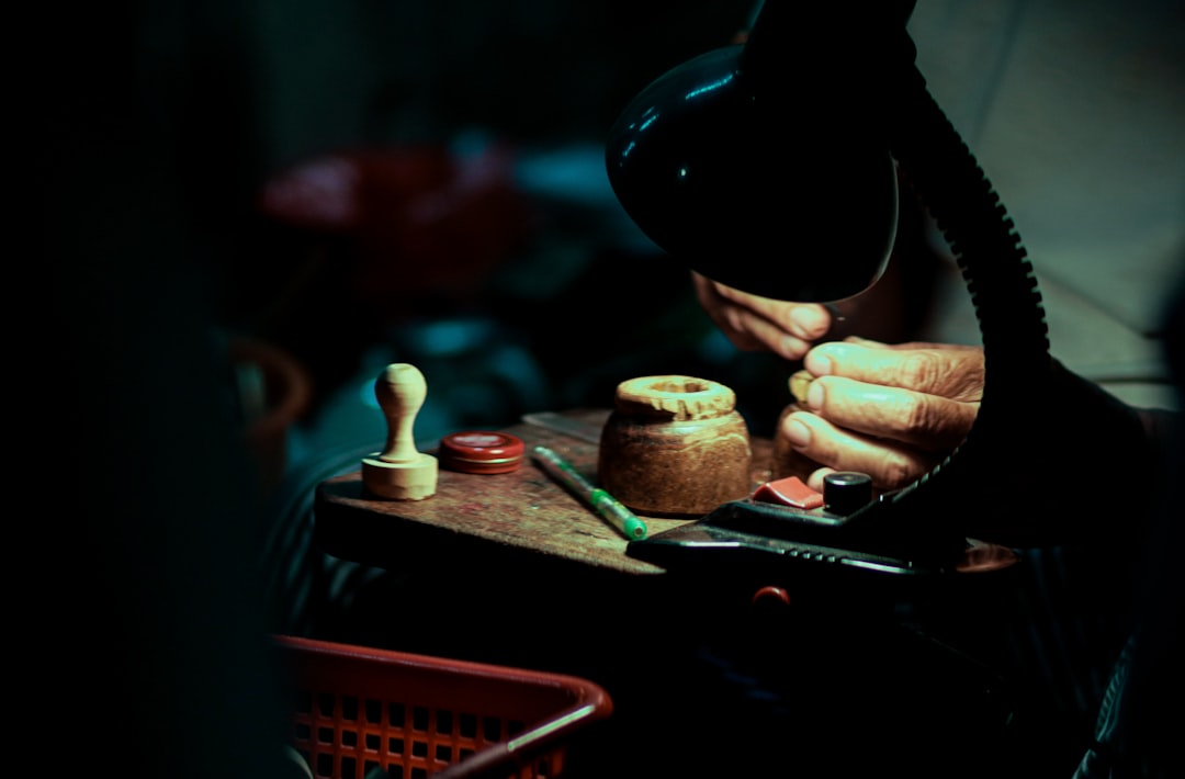 A person working on a piece of wood