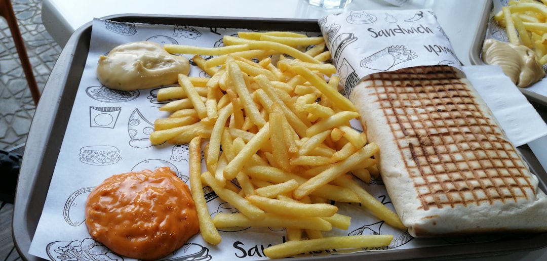 french fries on white paper